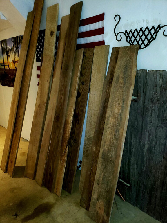 prepping barn wood for photo studio floor
