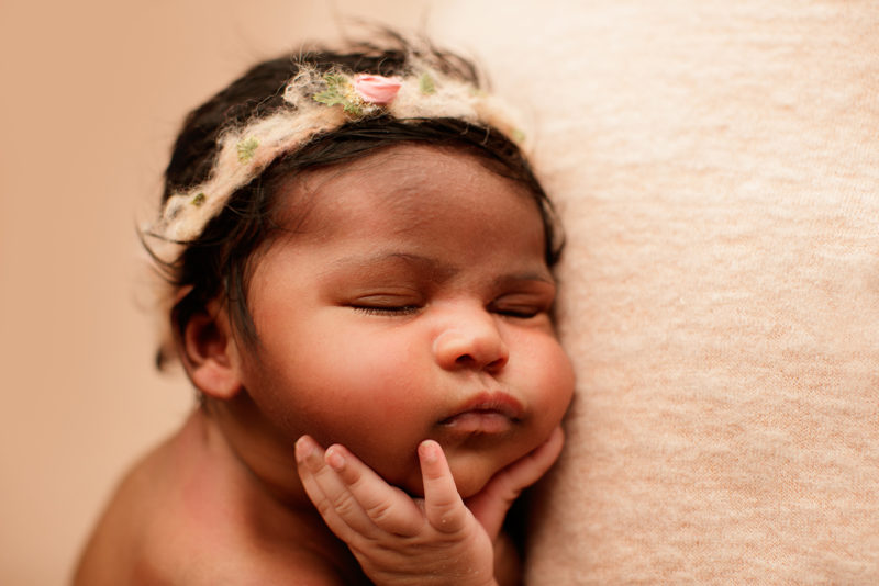 newborn baby girl in headband, Alexandria, VA