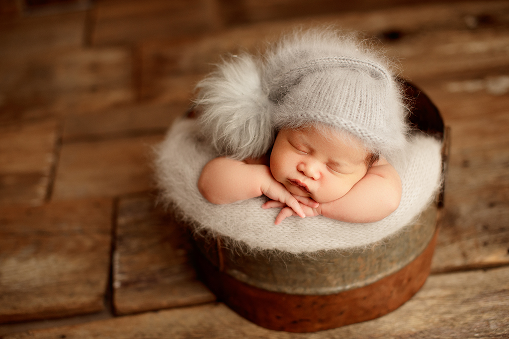 newborn baby in wintery hat in Northern Virginia