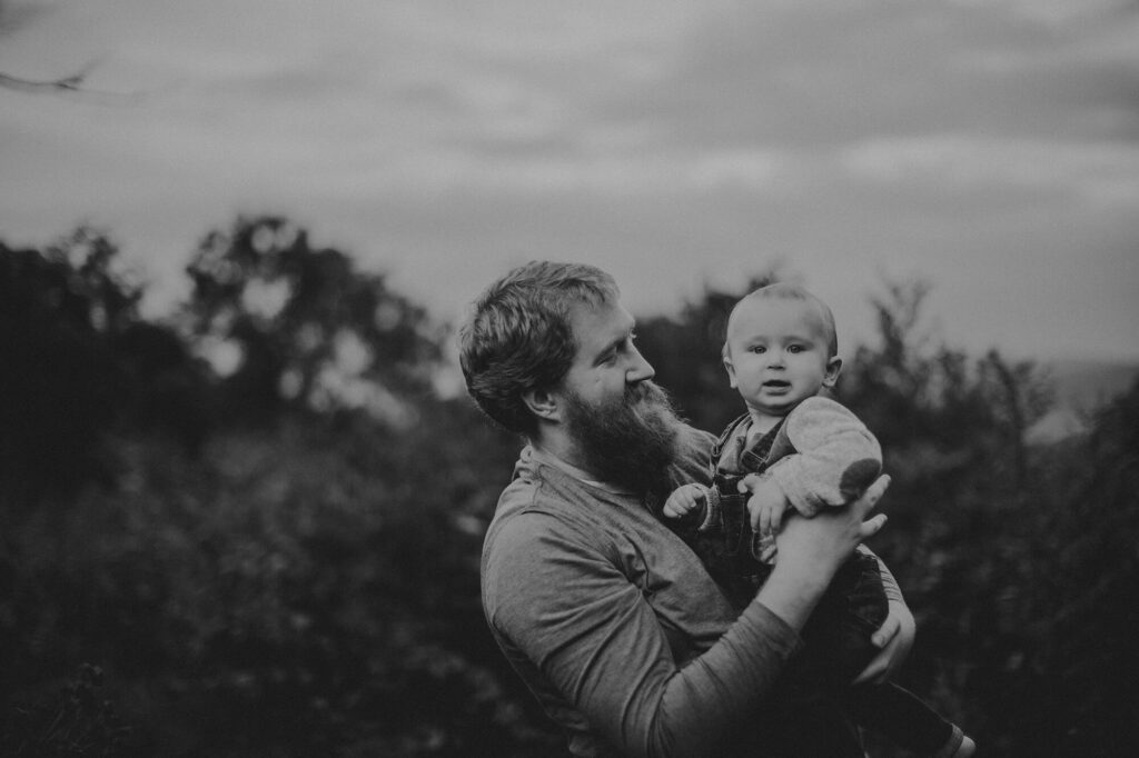 black and white photos of dad and baby