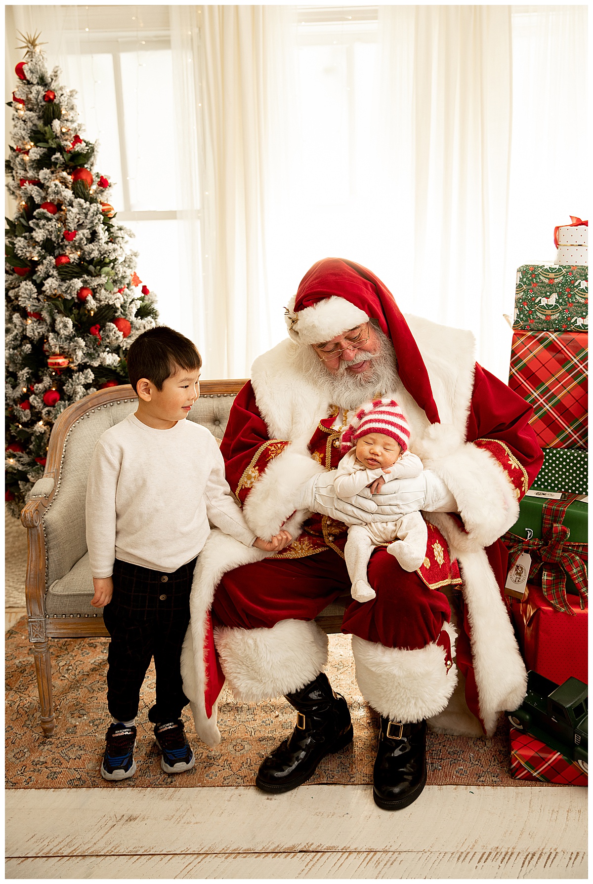 Two small children with Santa by Washington DC Family Photographer