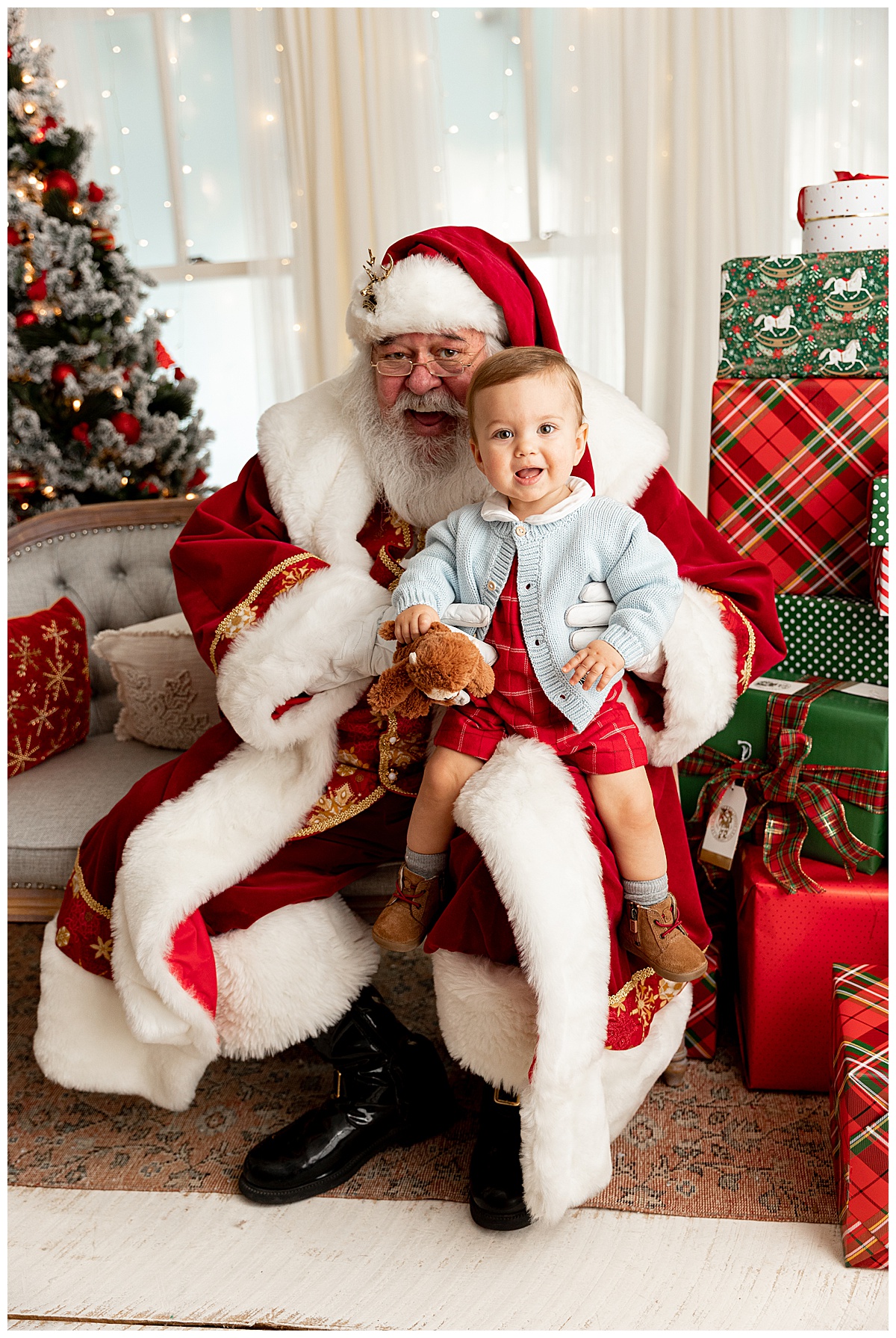 Child on Santa's lap by Norma Fayak Photography