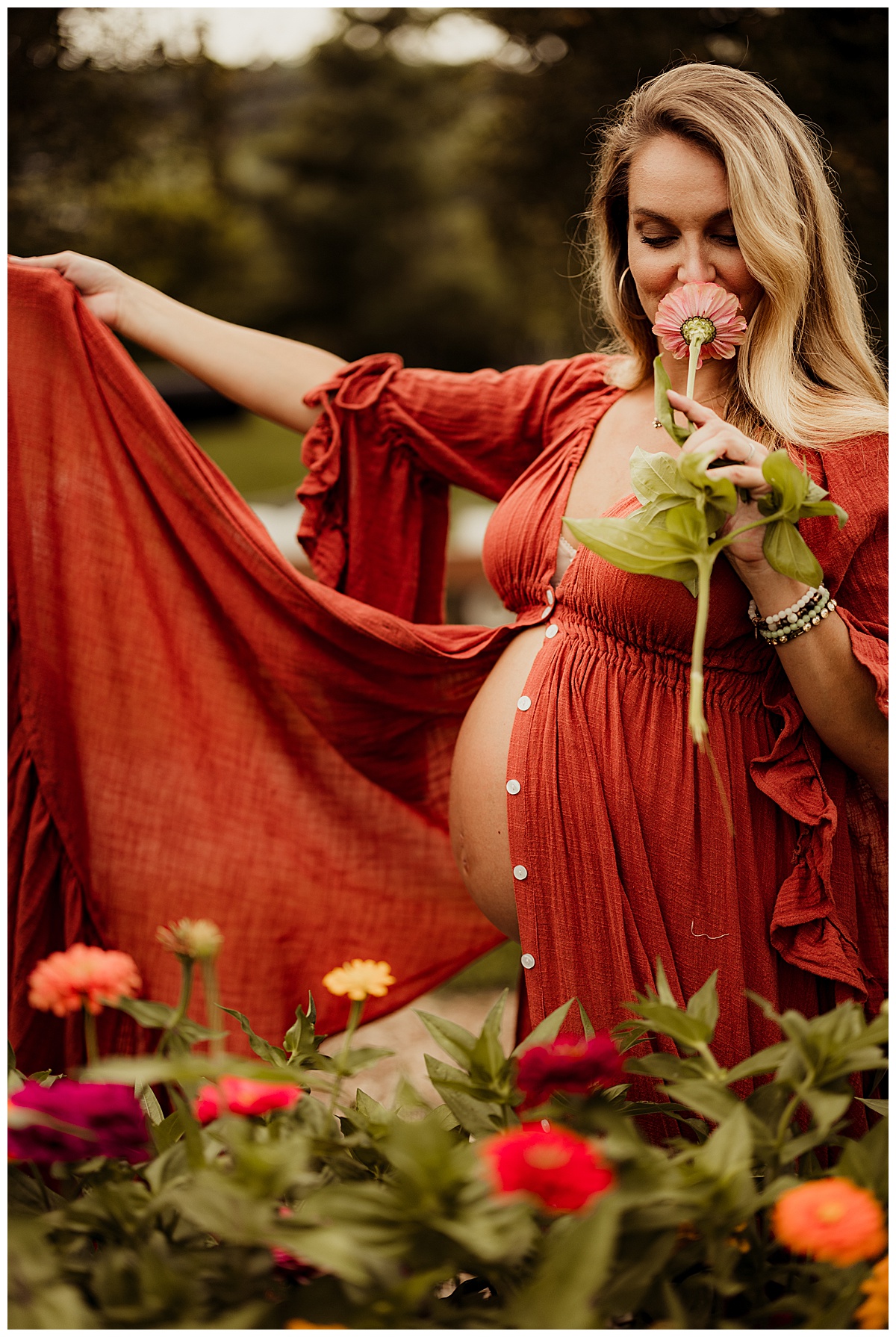 Woman smelling flower for Washington DC Maternity Photographer