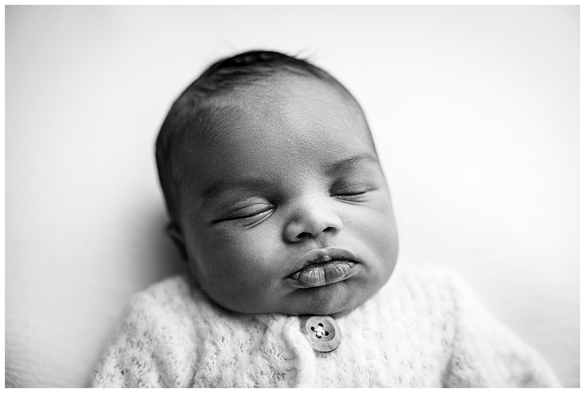 Baby lays quietly for Occoquan, VA Newborn Studio
