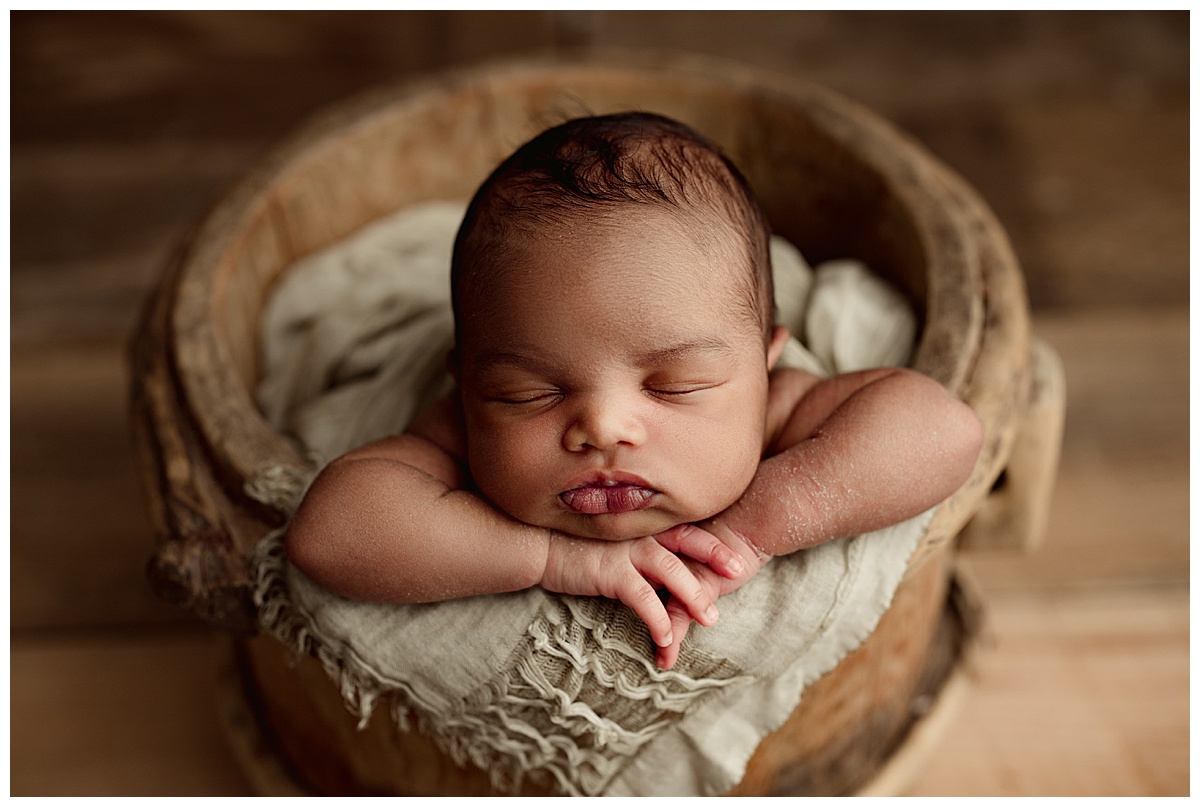 Baby boy lays on blanket for Washington DC Newborn Photographer