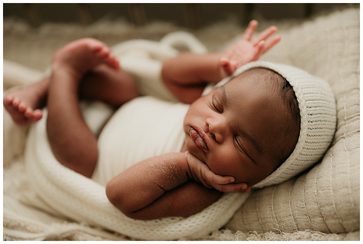 Baby boy smiles for Washington DC Newborn Photographer