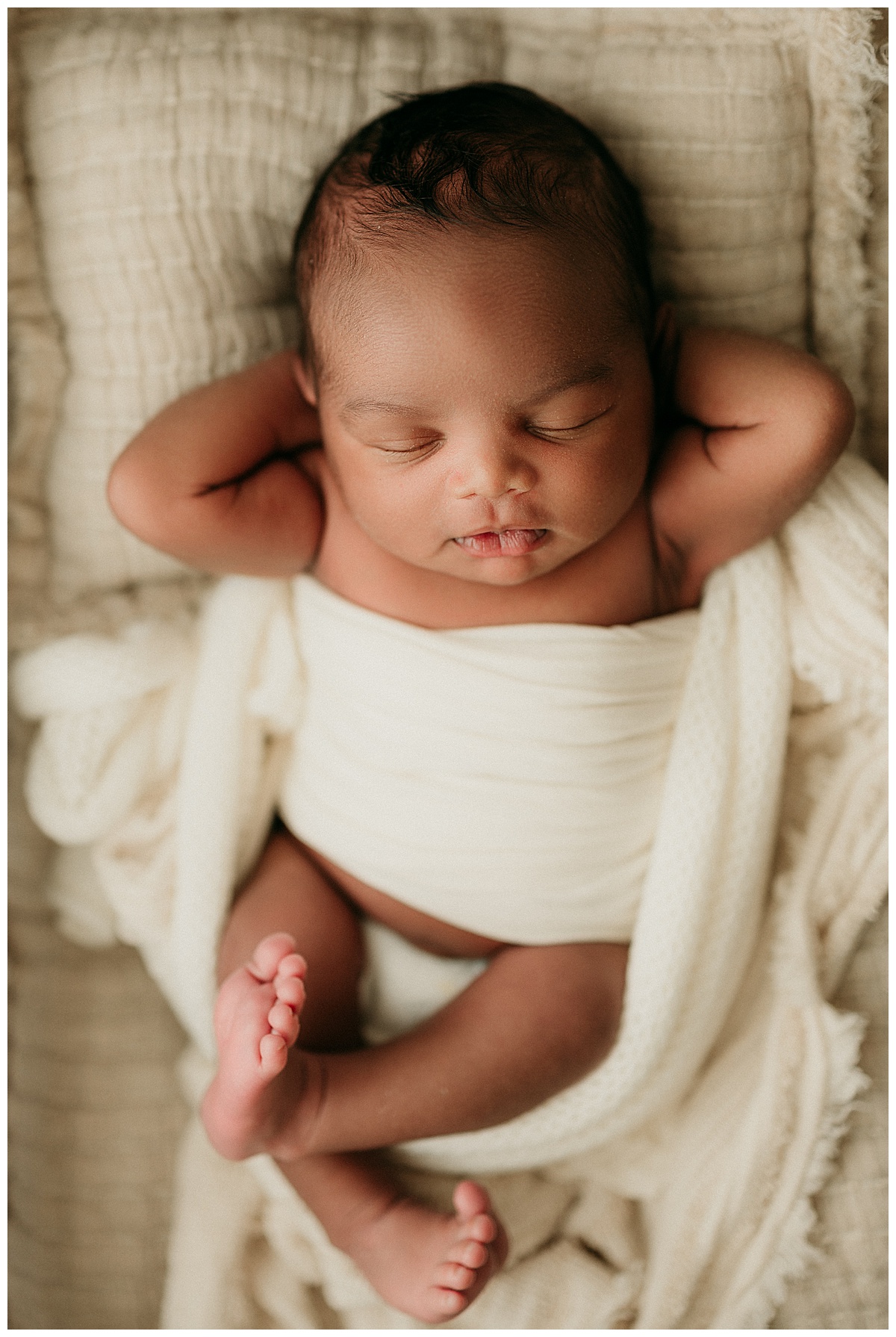 Baby boy relaxes for Norma Fayak Photography