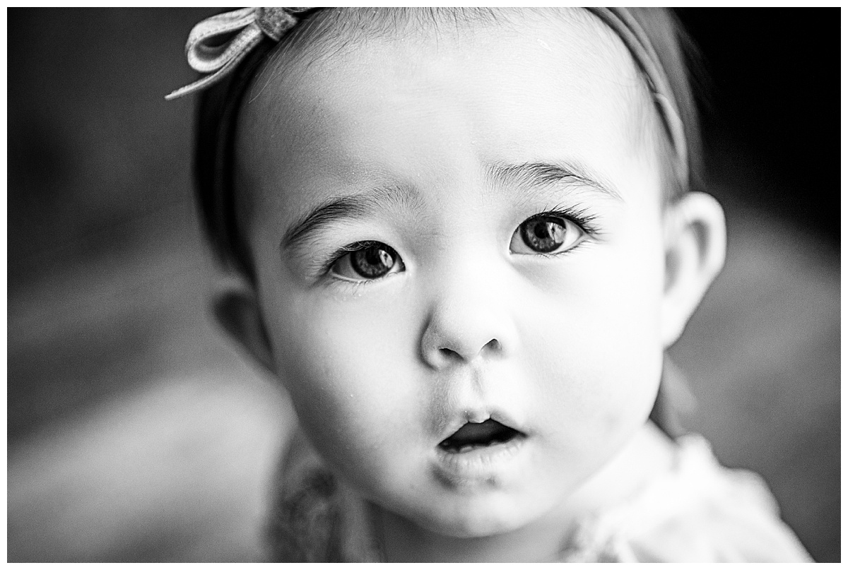 Toddler looks happy by Norma Fayak Photography