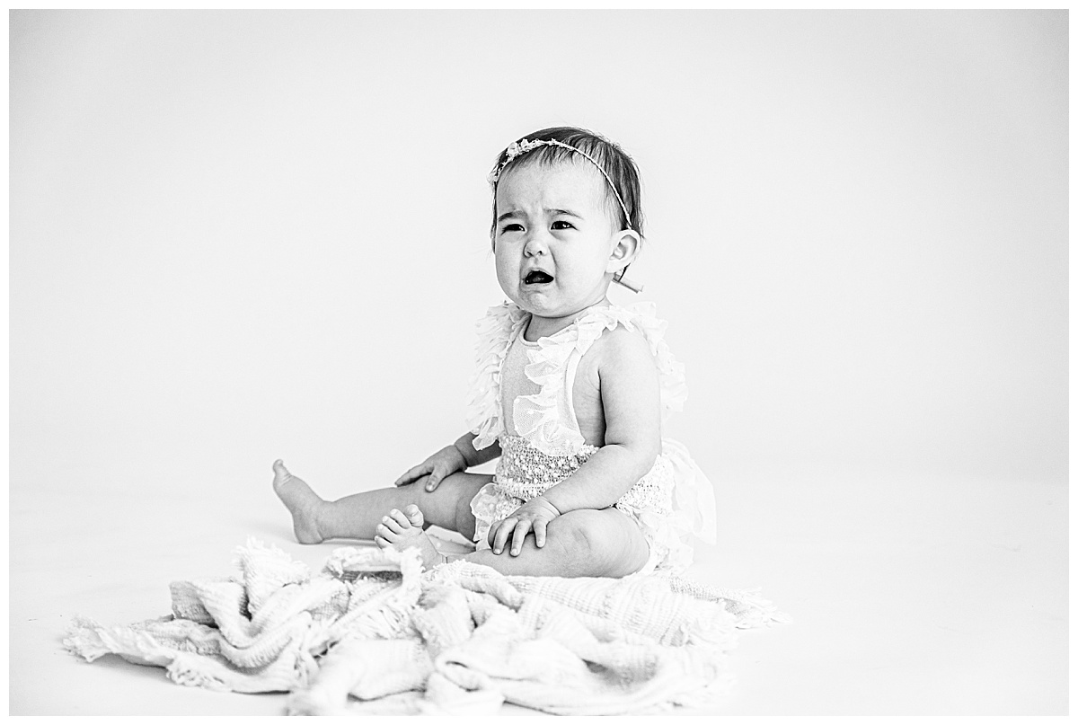 Sitting baby crying by Washington DC Baby Photographer