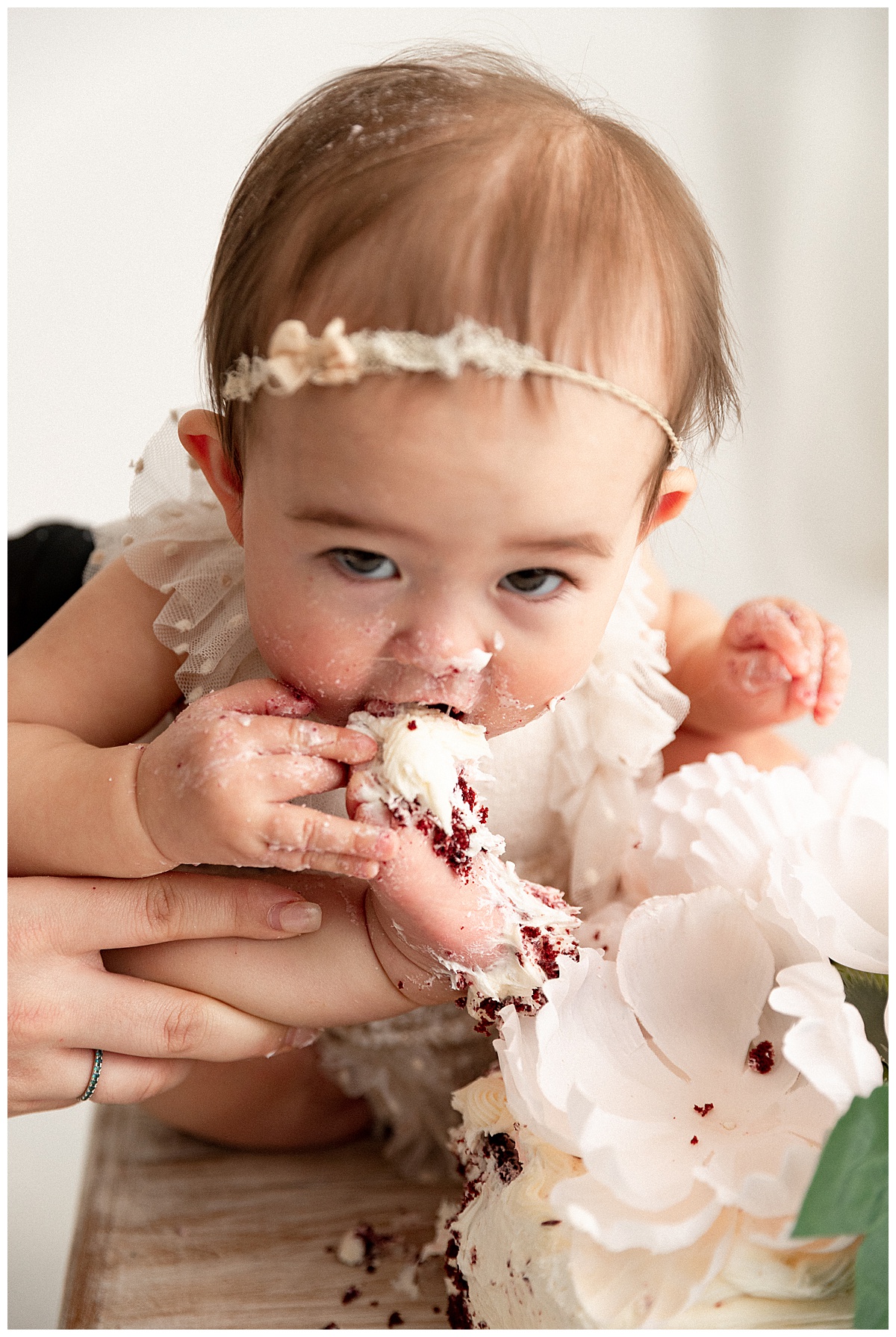 Little one eating cake off toe for Washington DC Baby Photographer