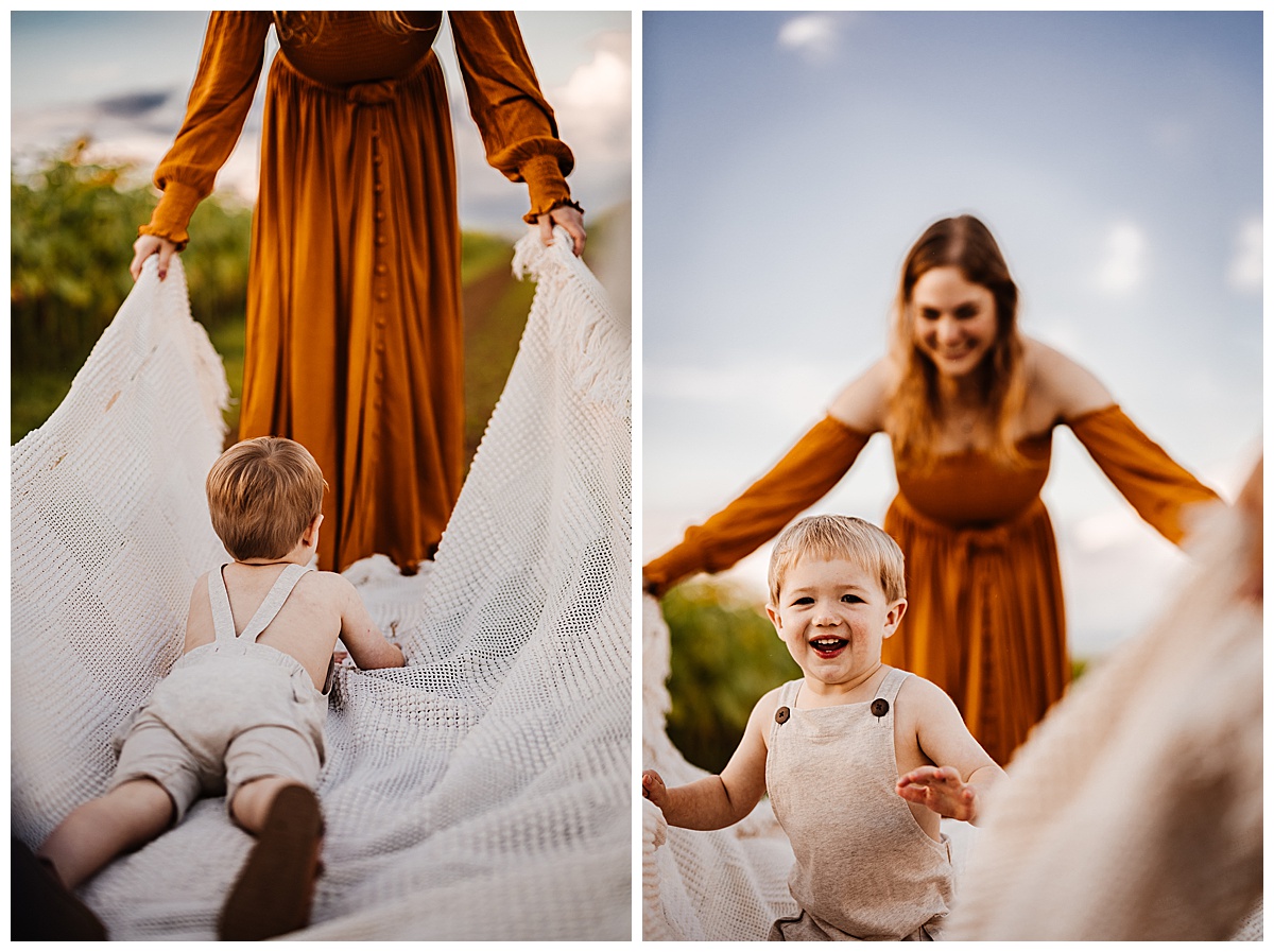 Using a sheet, mother and son share a smile by Washington DC Family Photographer