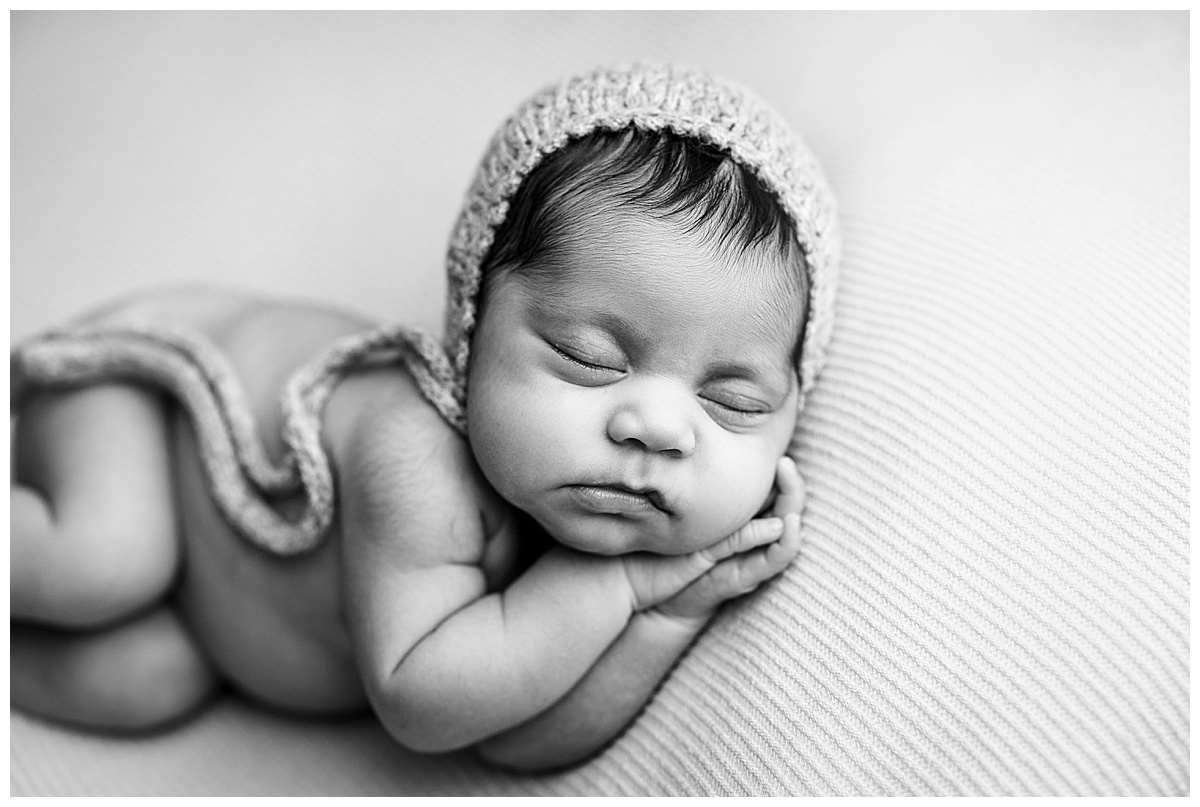 Baby bonnet on little ones head for Washington DC Newborn Photographer
