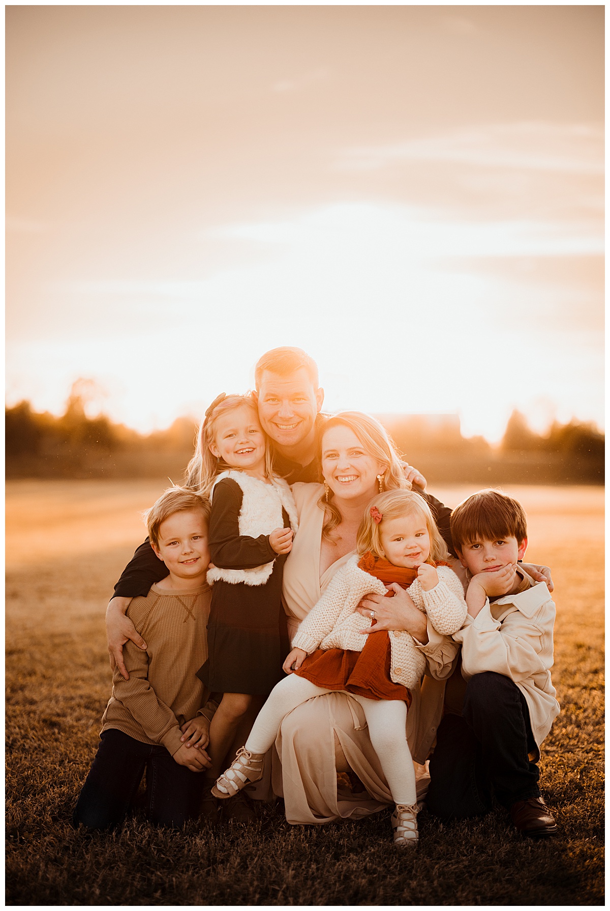 Family smiles big for Norma Fayak Photography