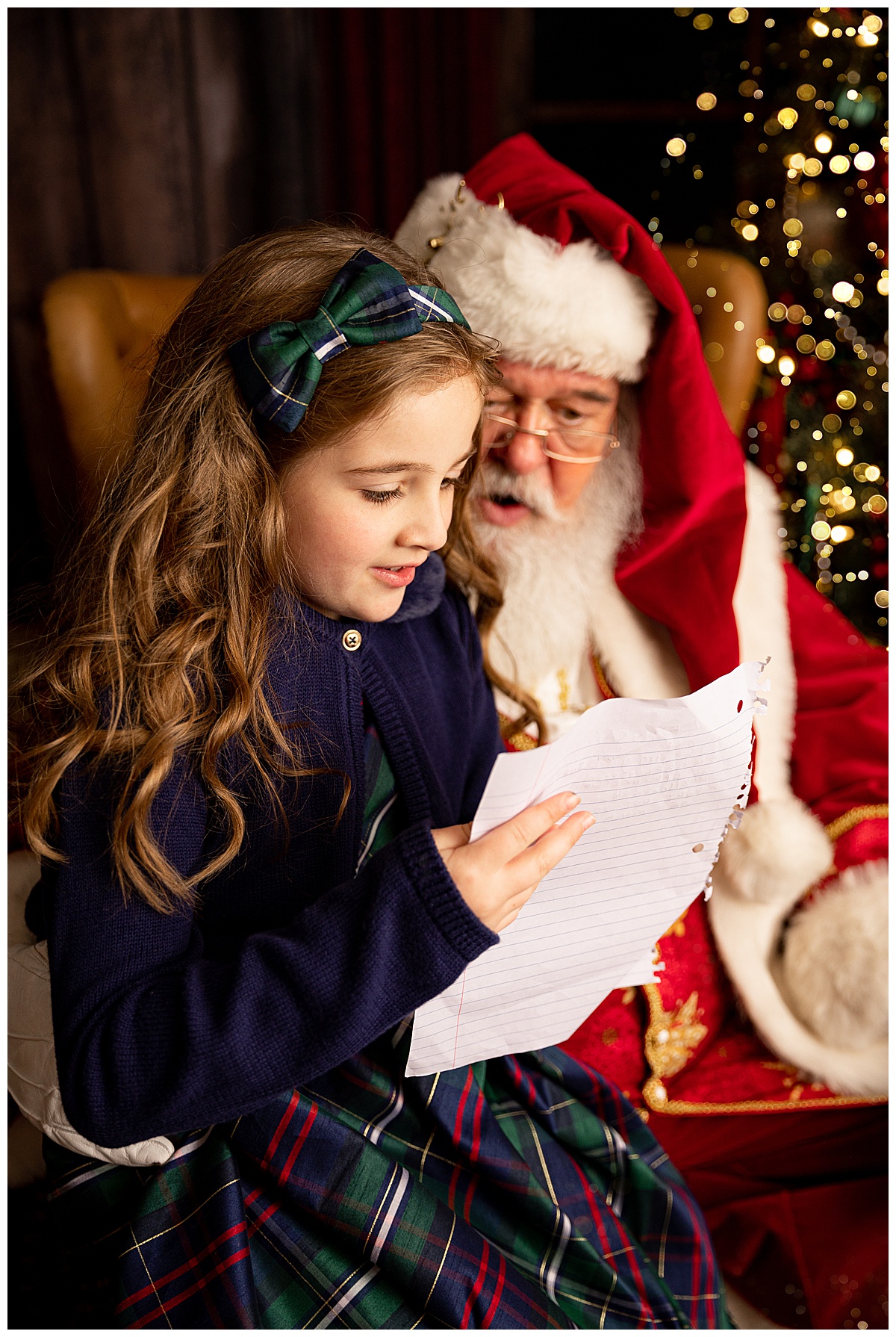 Little girl reads note for Washington DC Family Photographer