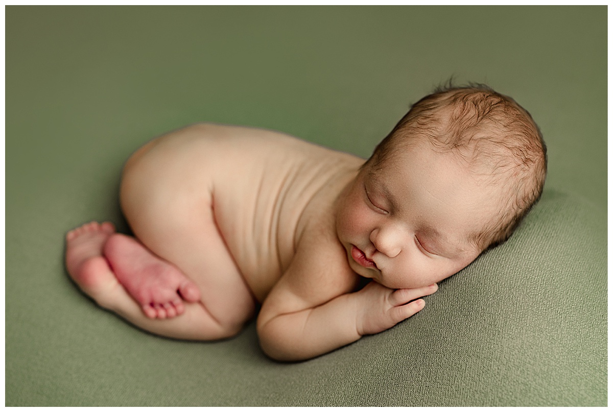 Little one on tummy for Norma Fayak Photography