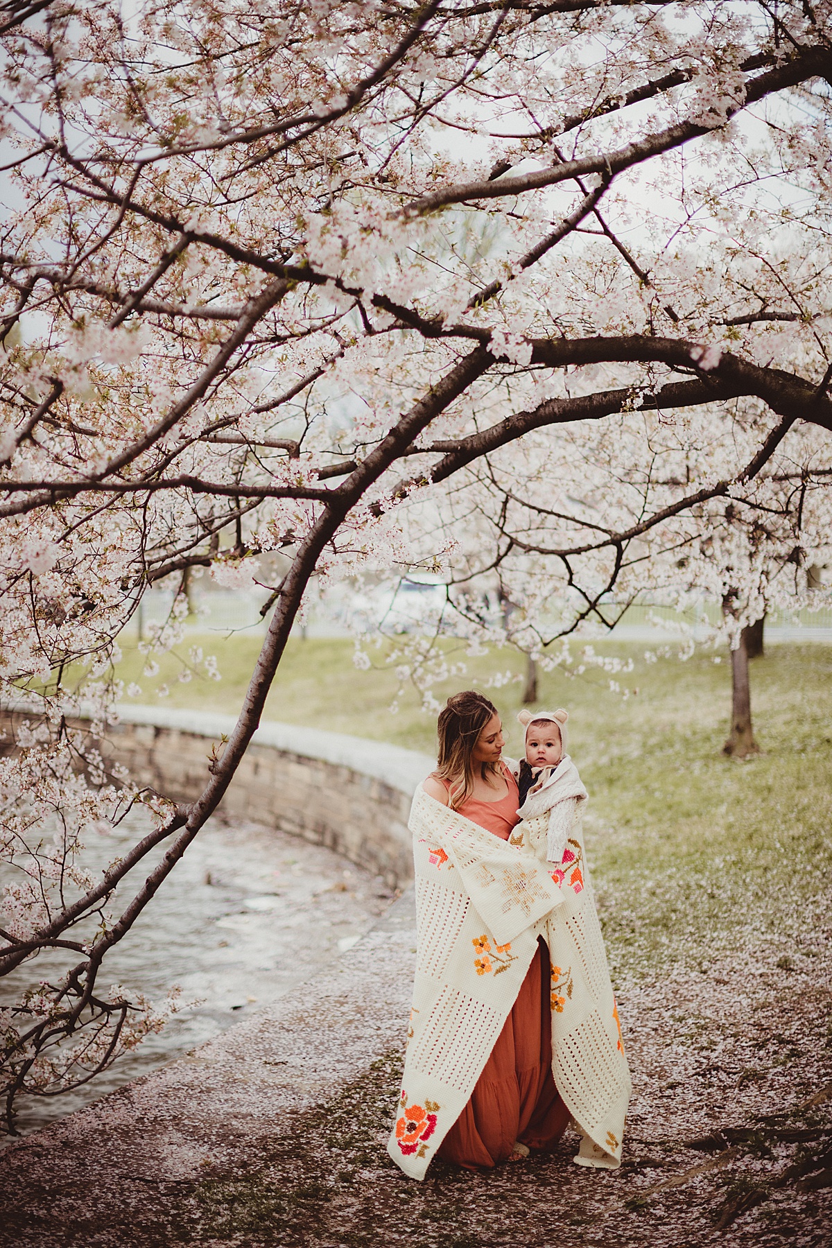 Mother and Son under Cherry Blossom tree by Washtington DC Family Photographer