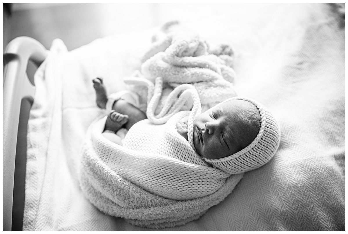 Baby wrapped in white for Norma Fayak Photography