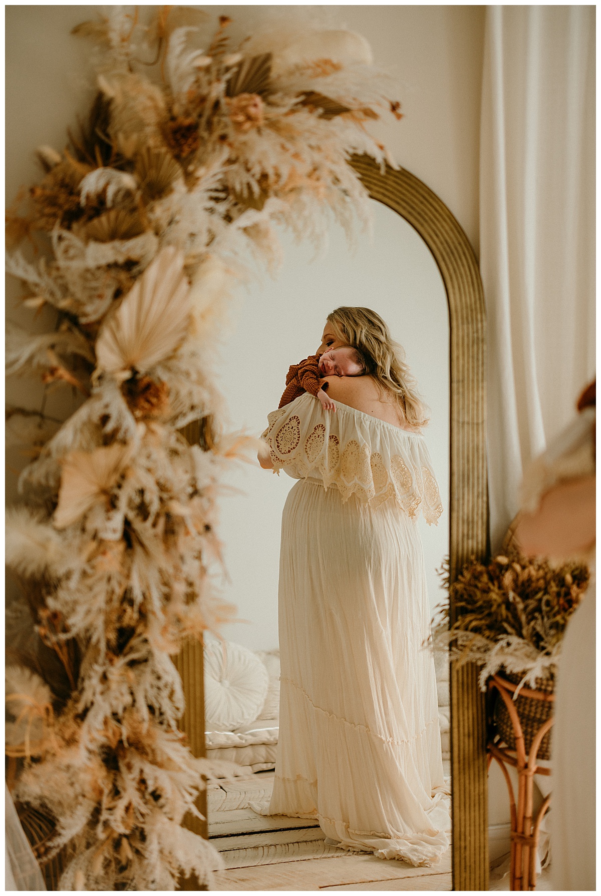 Mom and son in front of mirror for Norma Fayak Photography