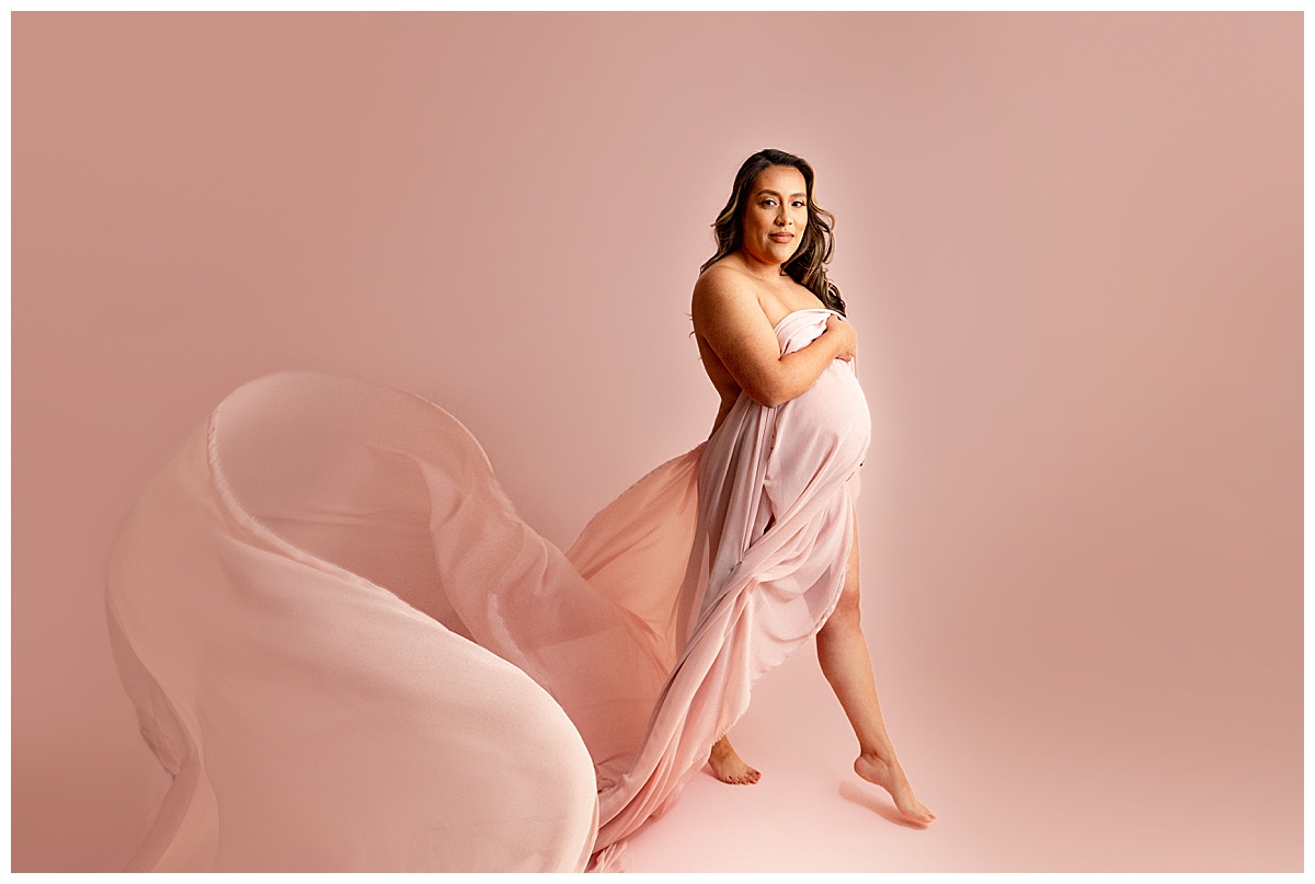 Person in pink gown for Studio Maternity Session