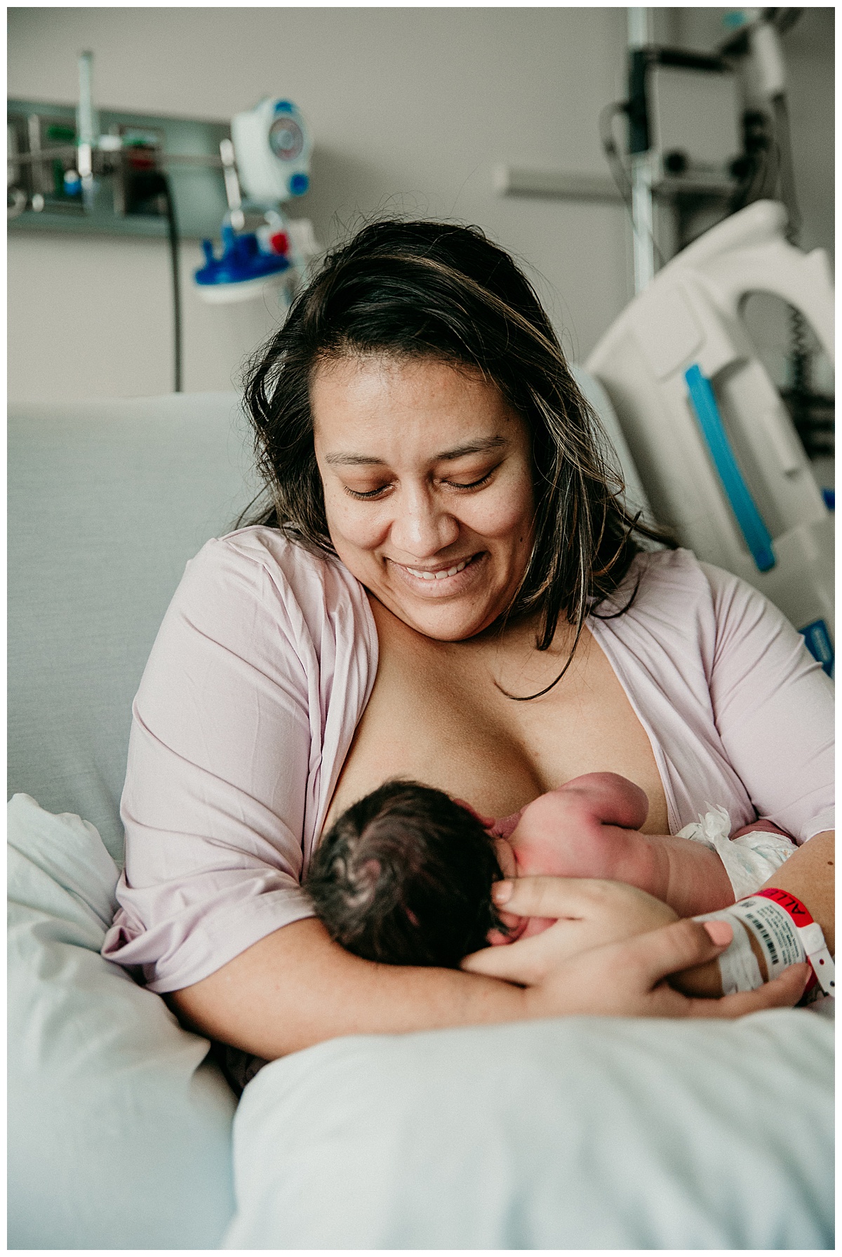 Mother nursing baby for Virginia Newborn Photographer
