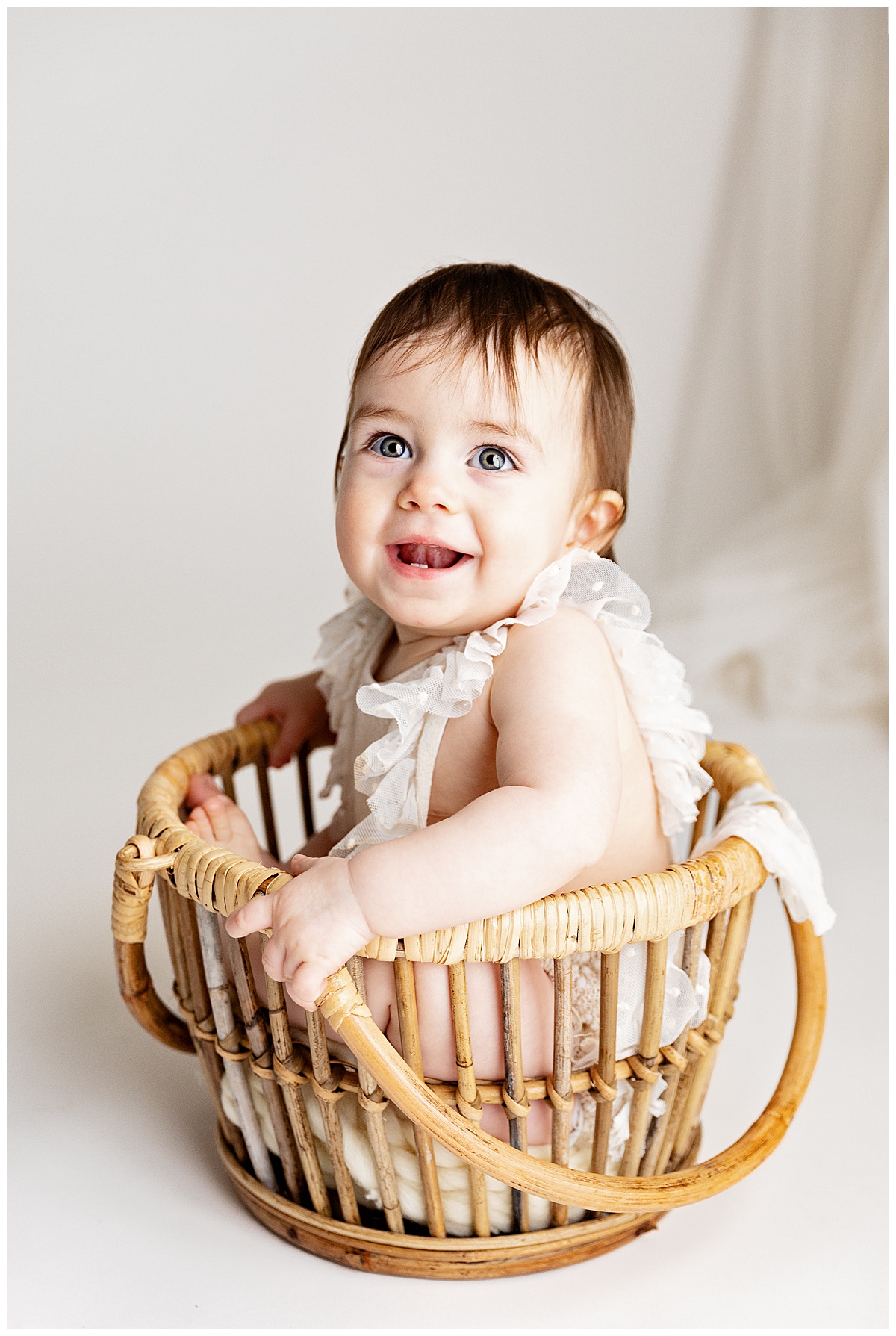 Little girl in basket for Norma Fayak Photography