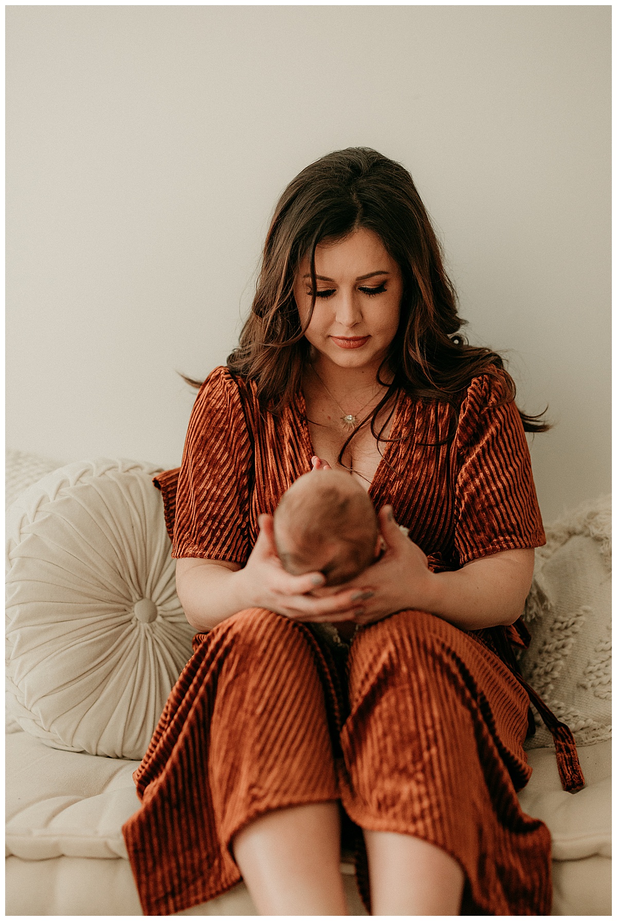 Mom looks at newborn for Virginia Newborn Photographer 