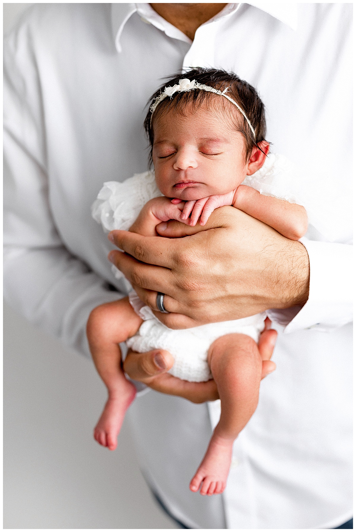 Dad holds baby girl for Virginia Newborn Photographer 