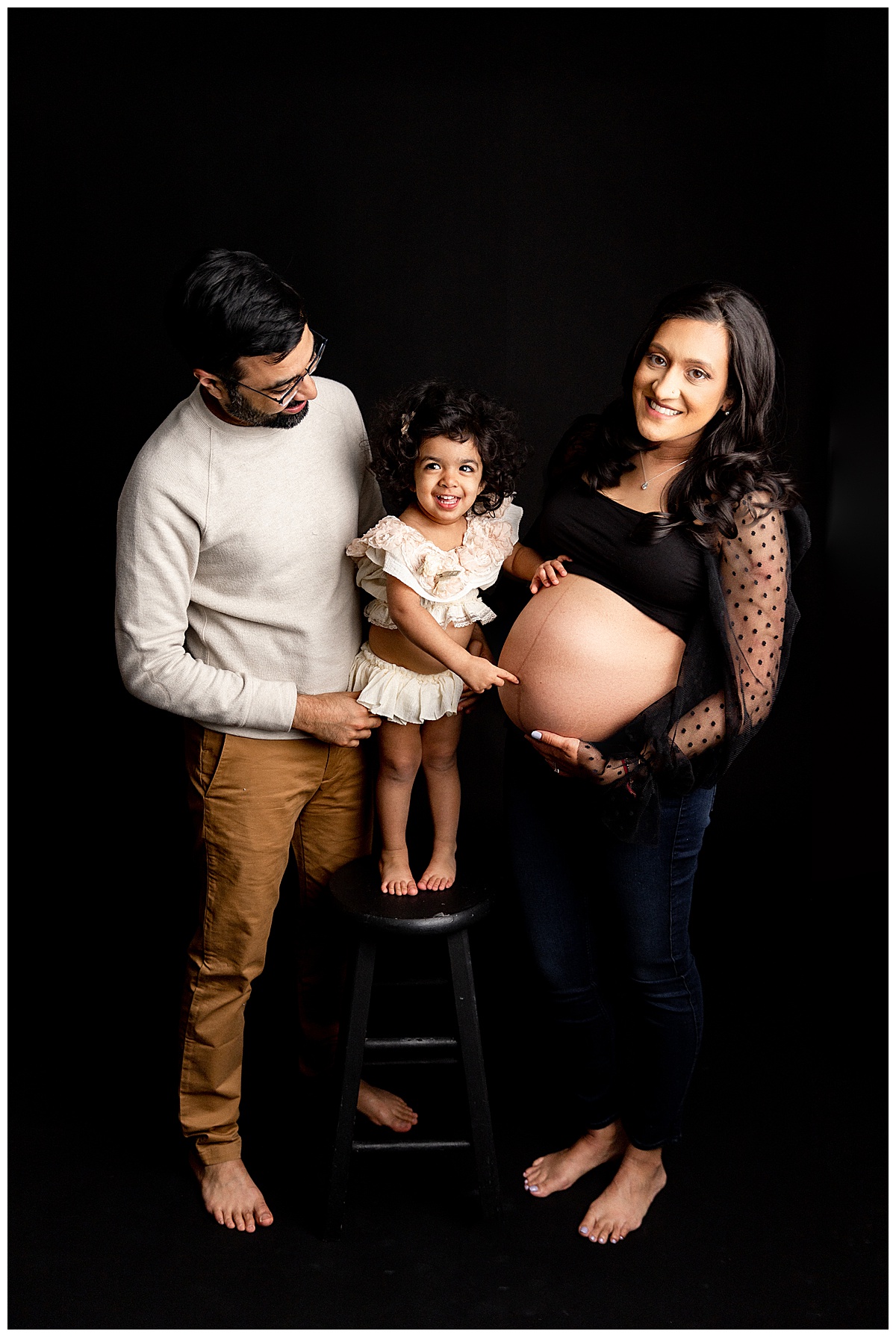 Little girl and Dad laugh and smile with pregnant Mama for Family Maternity Session