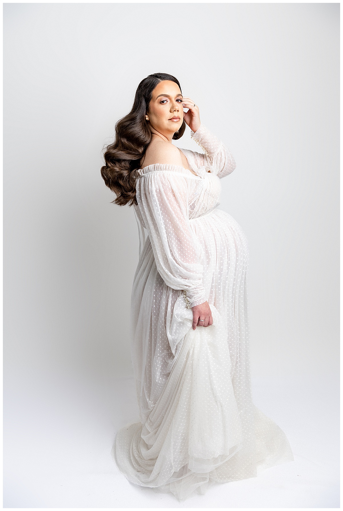 Gorgeous Mom stand in white maternity gown for Full Fine Art Maternity Session