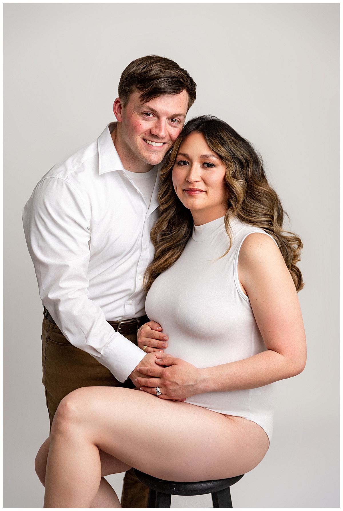 Parents embrace their pregnant belly for Virginia Maternity Photographer