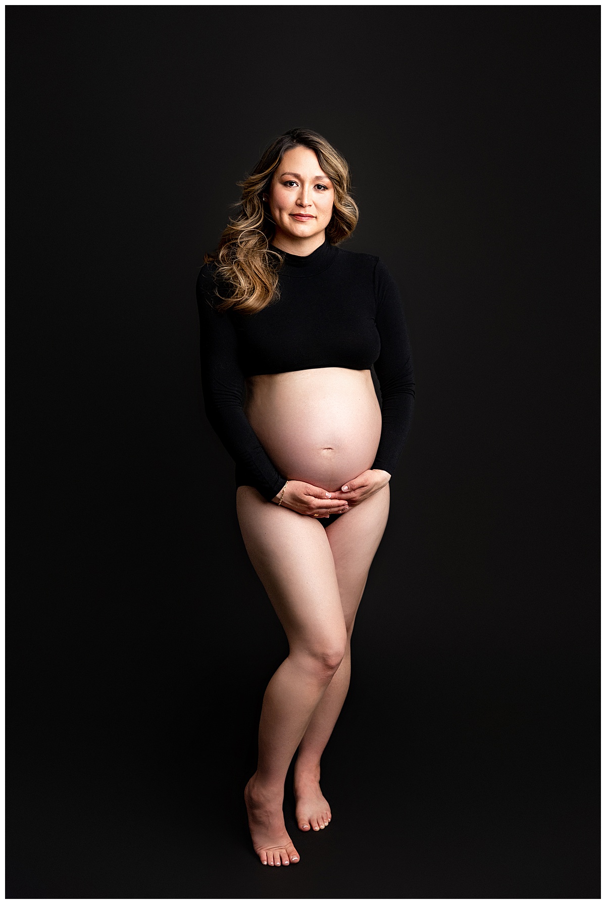Pregnant mama holds baby bump for Virginia Maternity Photographer