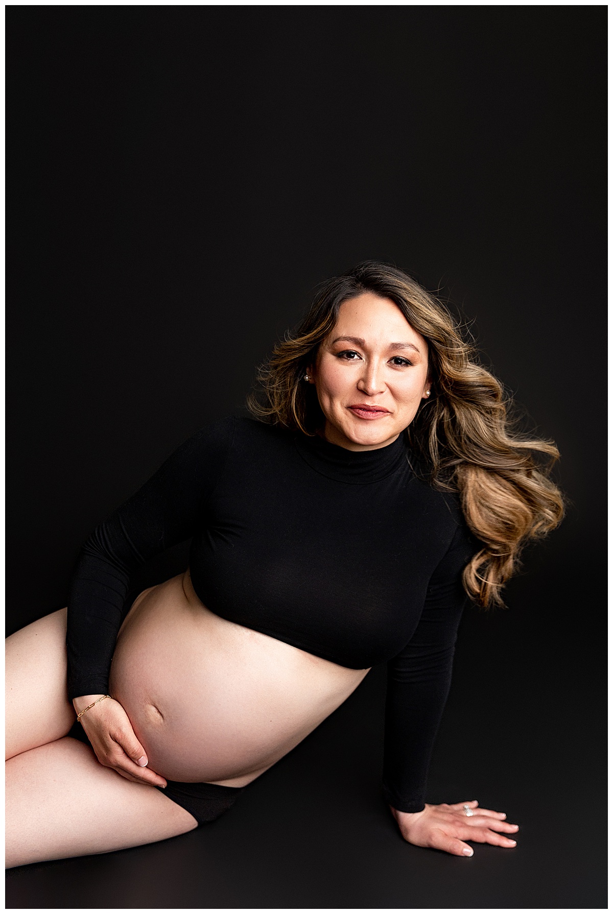 Stunning mother shares a soft smile for Virginia Maternity Photographer