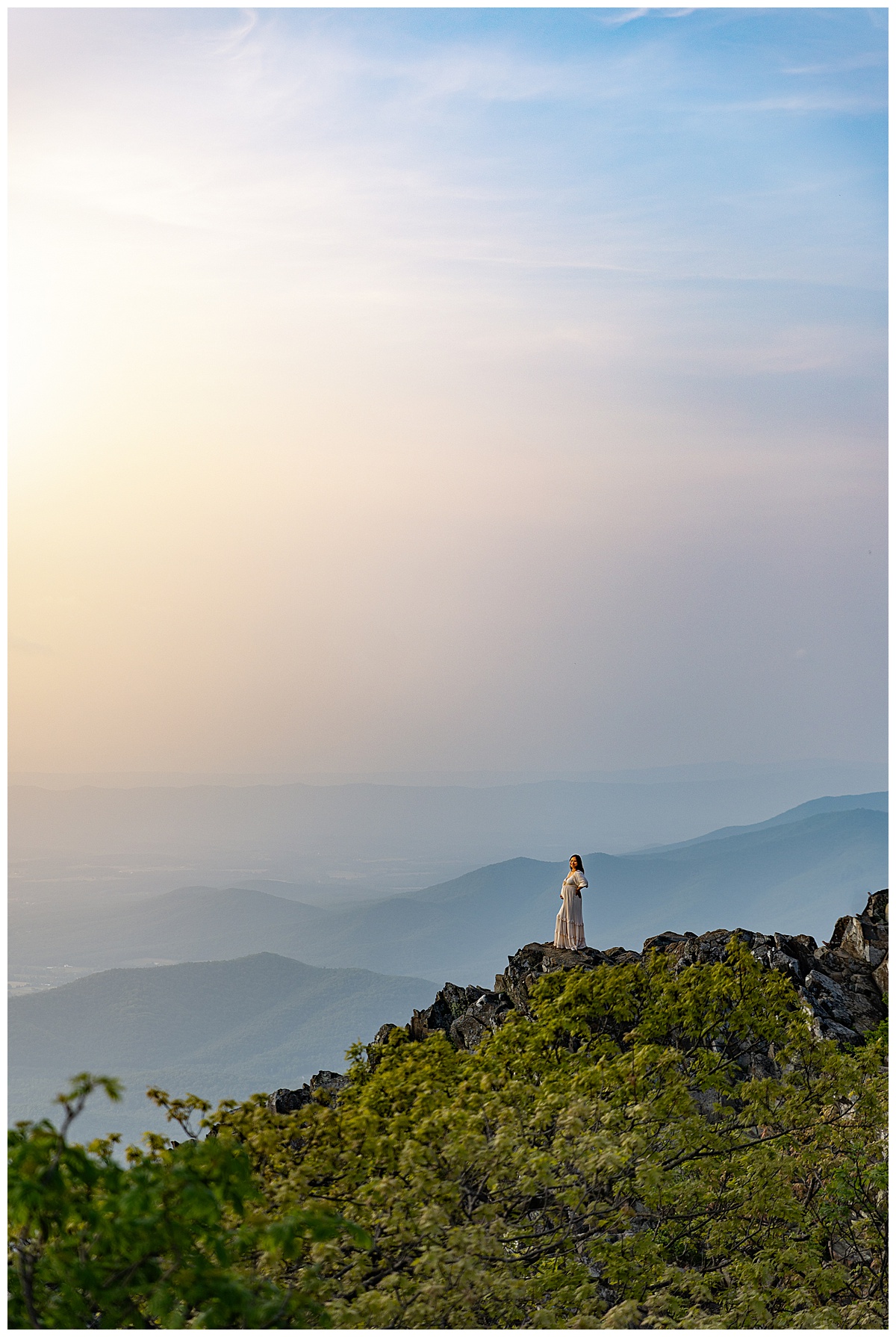 Mom stands on mountain for Virginia Maternity Photographer