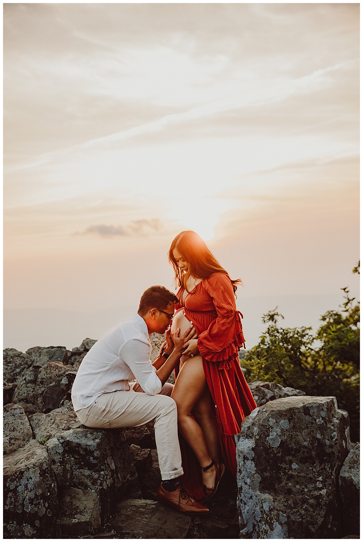 Man kisses pregnant belly for Norma Fayak Photography