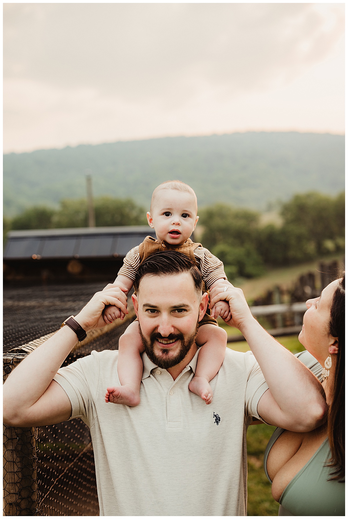 Baby rides on dada's shoulders for Norma Fayak Photography