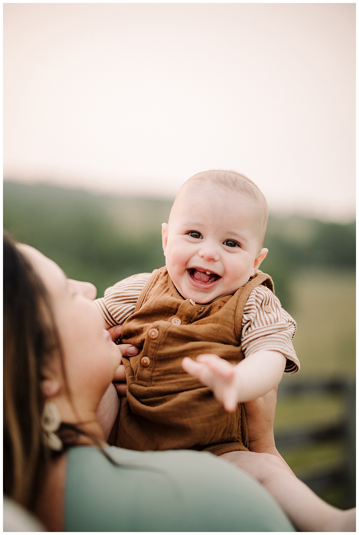Baby boy smiles bug for Virginia Family Photographer