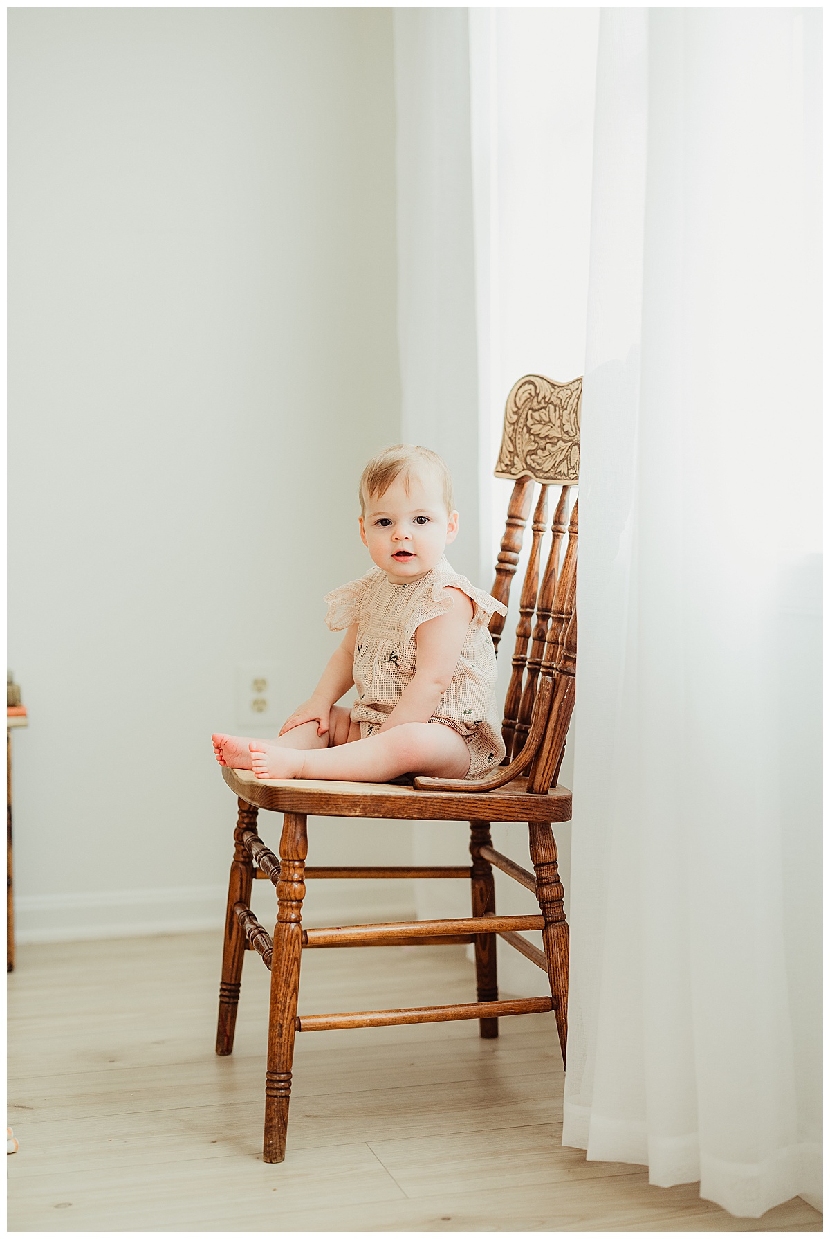 Little girls sits on chair for Virginia Family Photographer 
