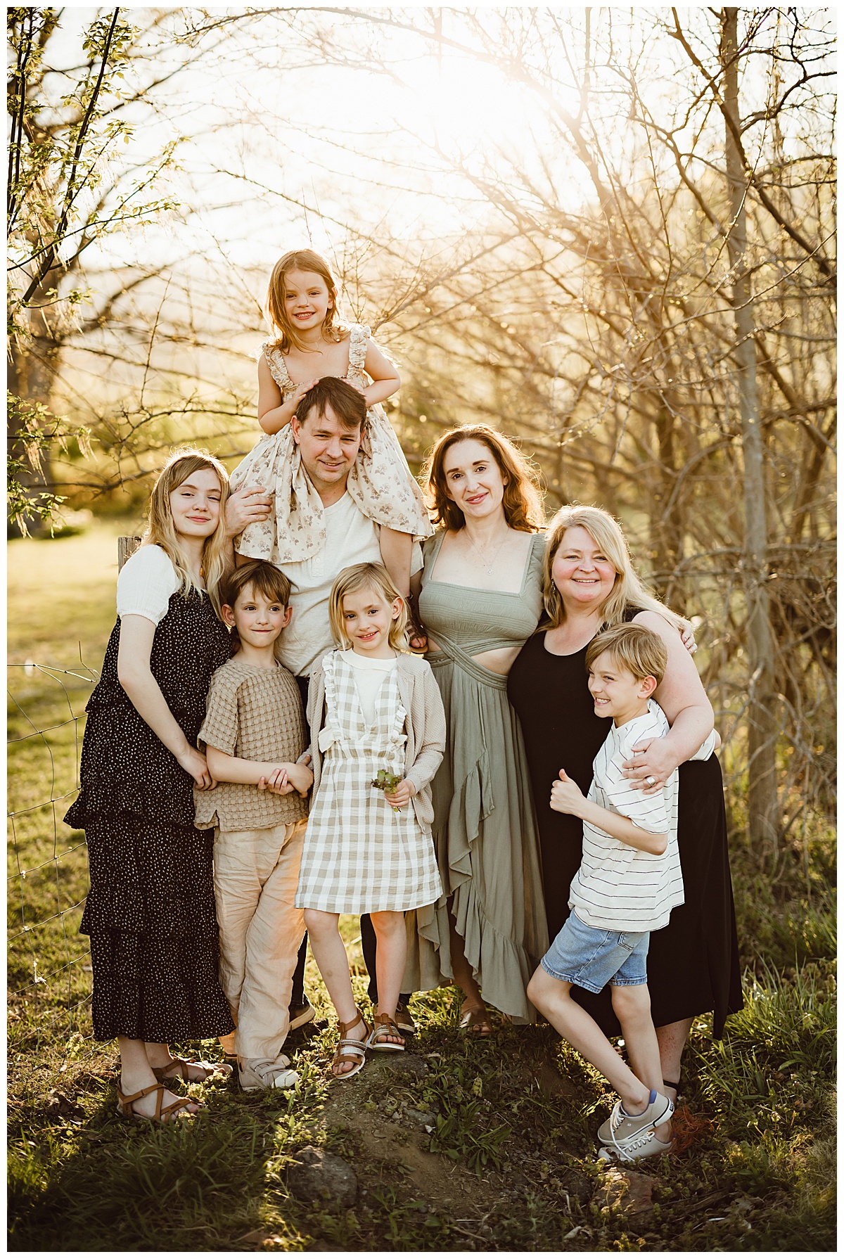 Parents hold children close for Norma Fayak Photography