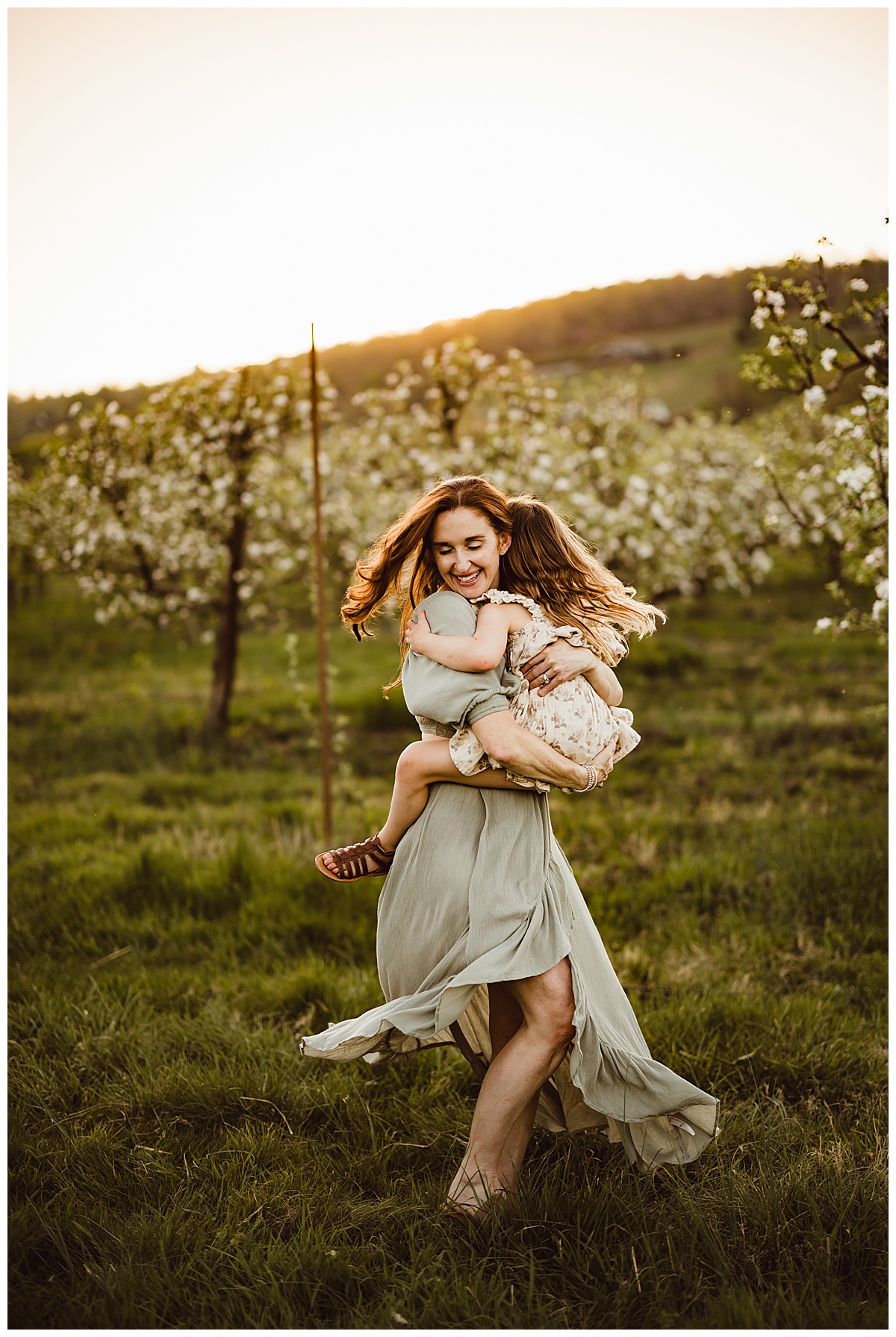 Mom spins around with baby girl for during their Blue Ridge Mountains Family Photos