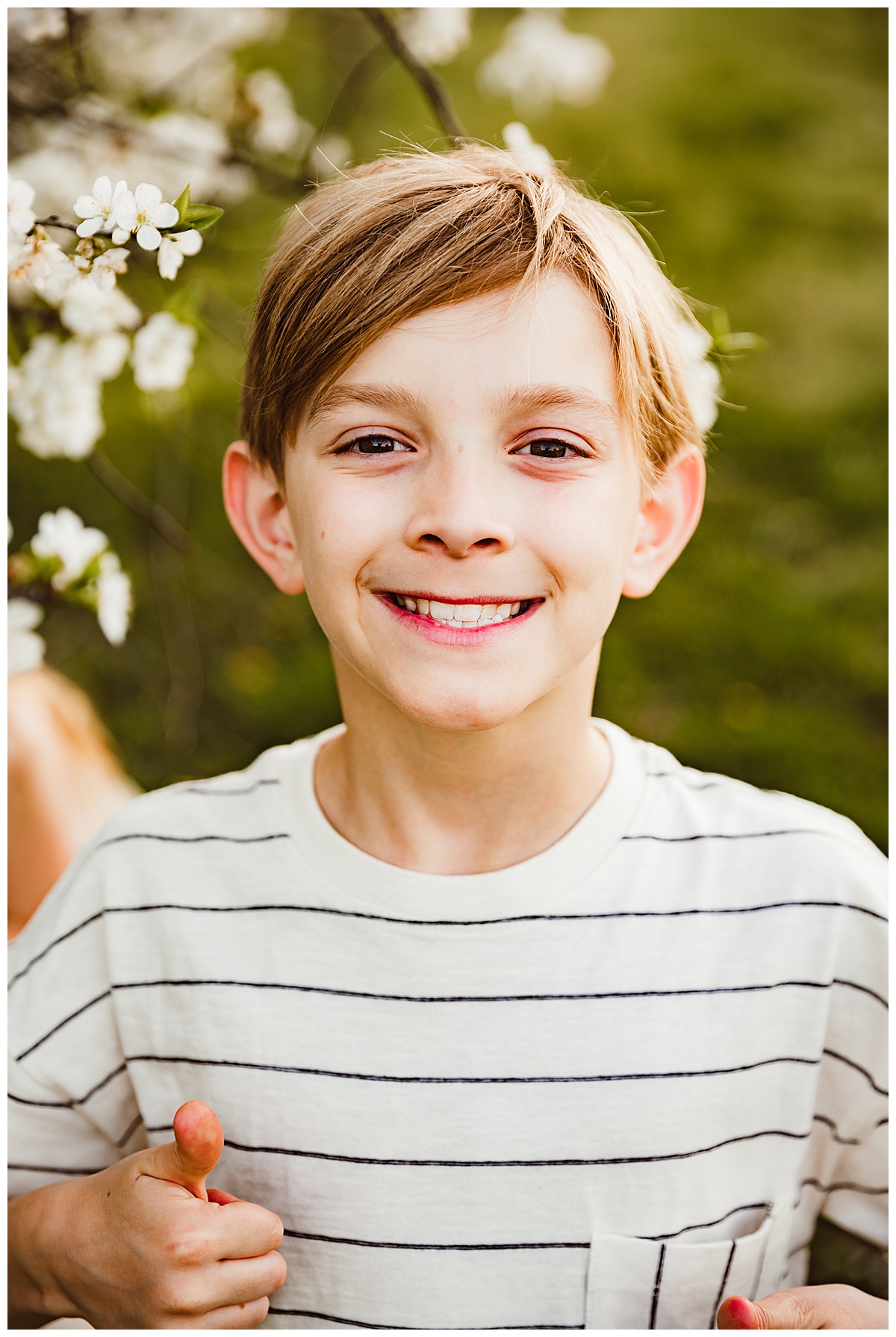 Young boy smiles big for Virginia Family Photographer
