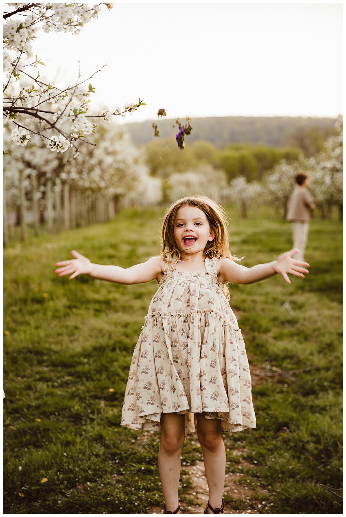 Daughter plays in the field for Norma Fayak Photography