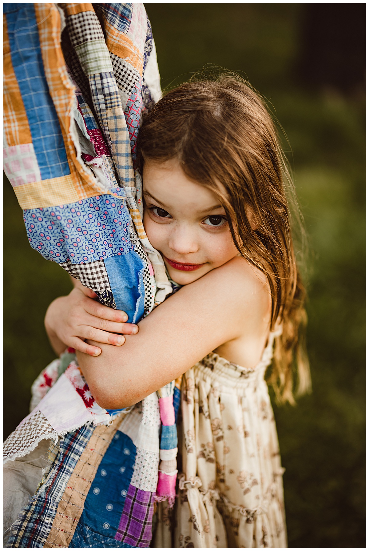Little girl holds onto blanket for Virginia Family Photographer
