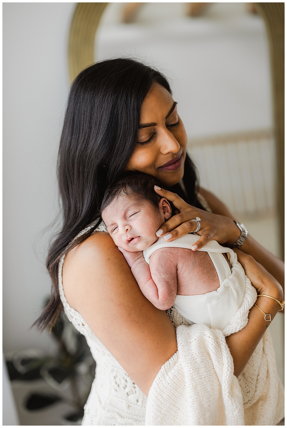 Mother holds onto baby boy for Norma Fayak Photography