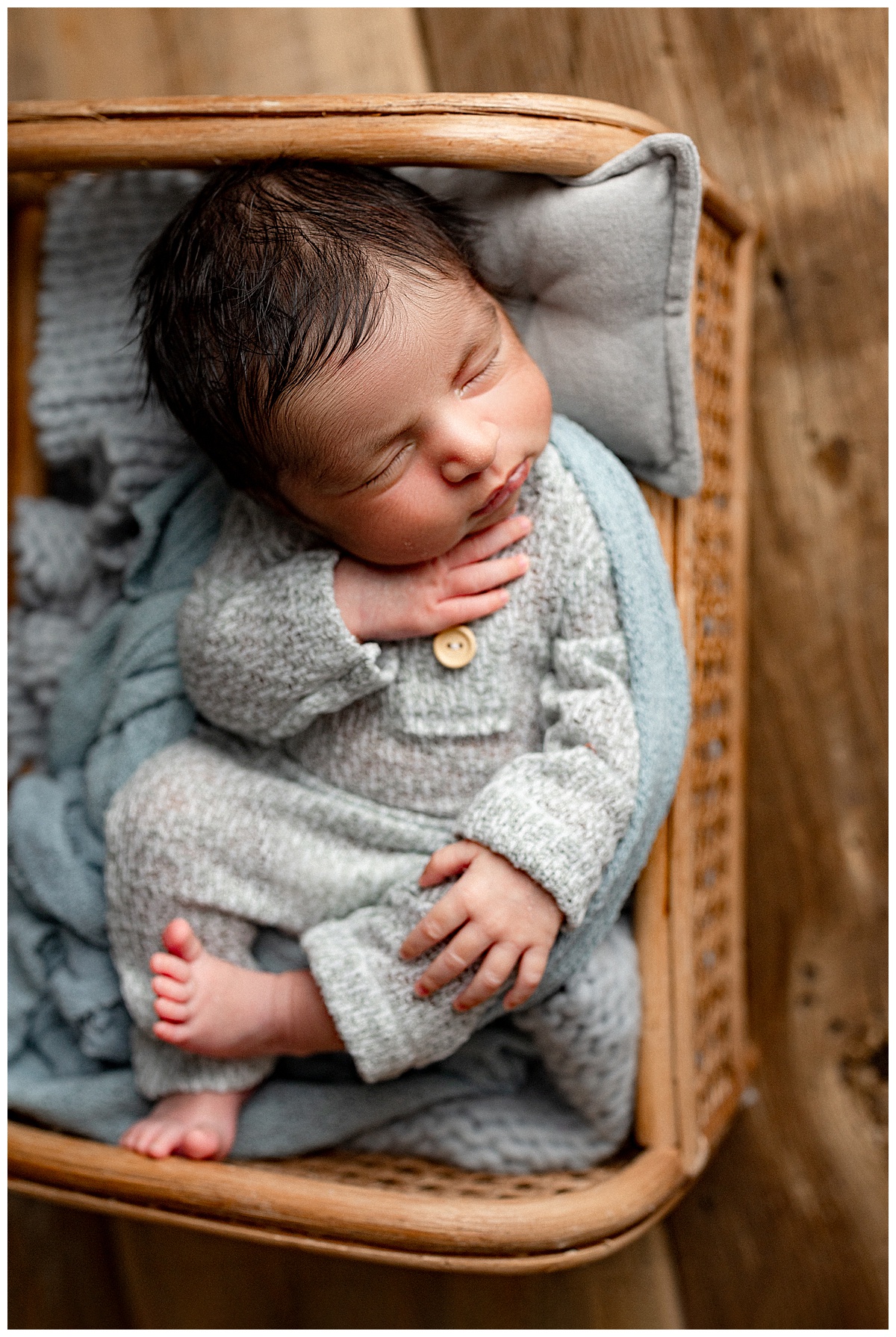 Baby wrapped in blue attire for Norma Fayak Photography