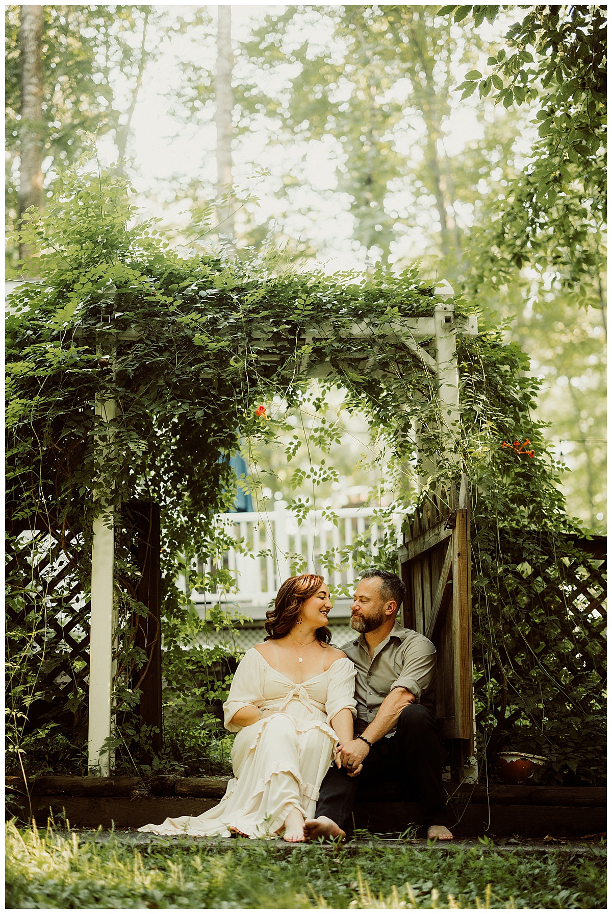 Parents hold each other close during their Magical Backyard Maternity Session