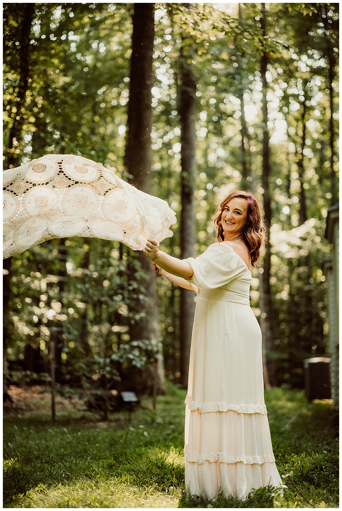 Mom throws blanket in their air for Virginia Maternity Photographer