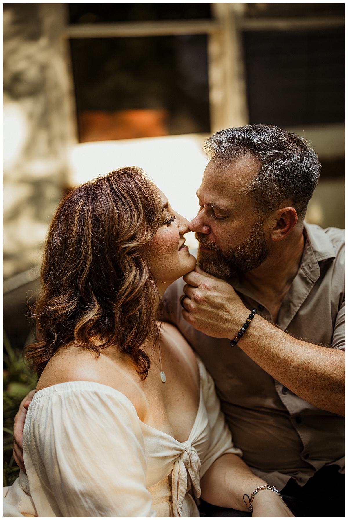 Mom and dad share intimate moment for Virginia Maternity Photographer