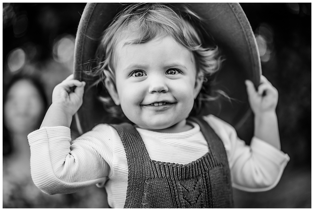 Young girl wears a hat for Virginia Family Photographer