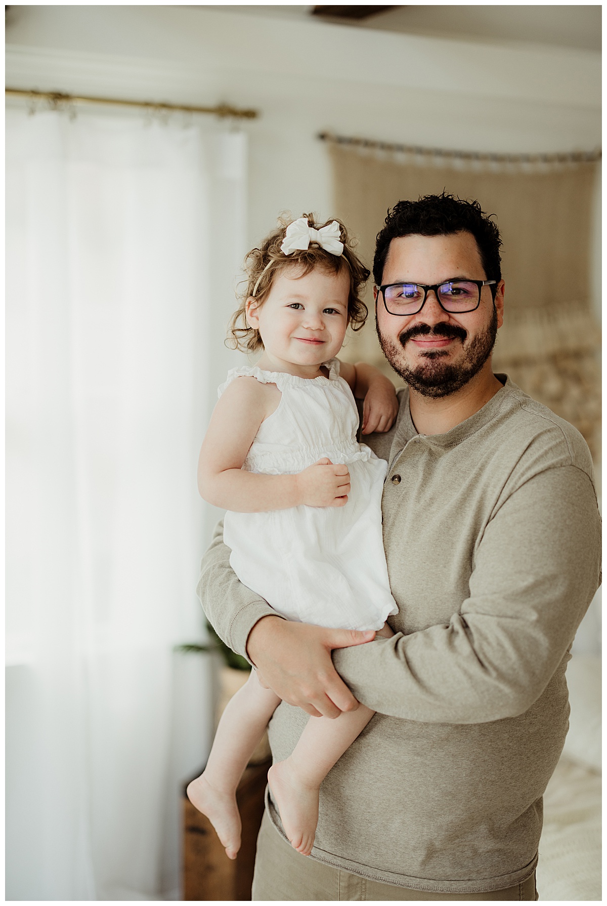 Dad holds baby girl for Virginia Newborn Photographer