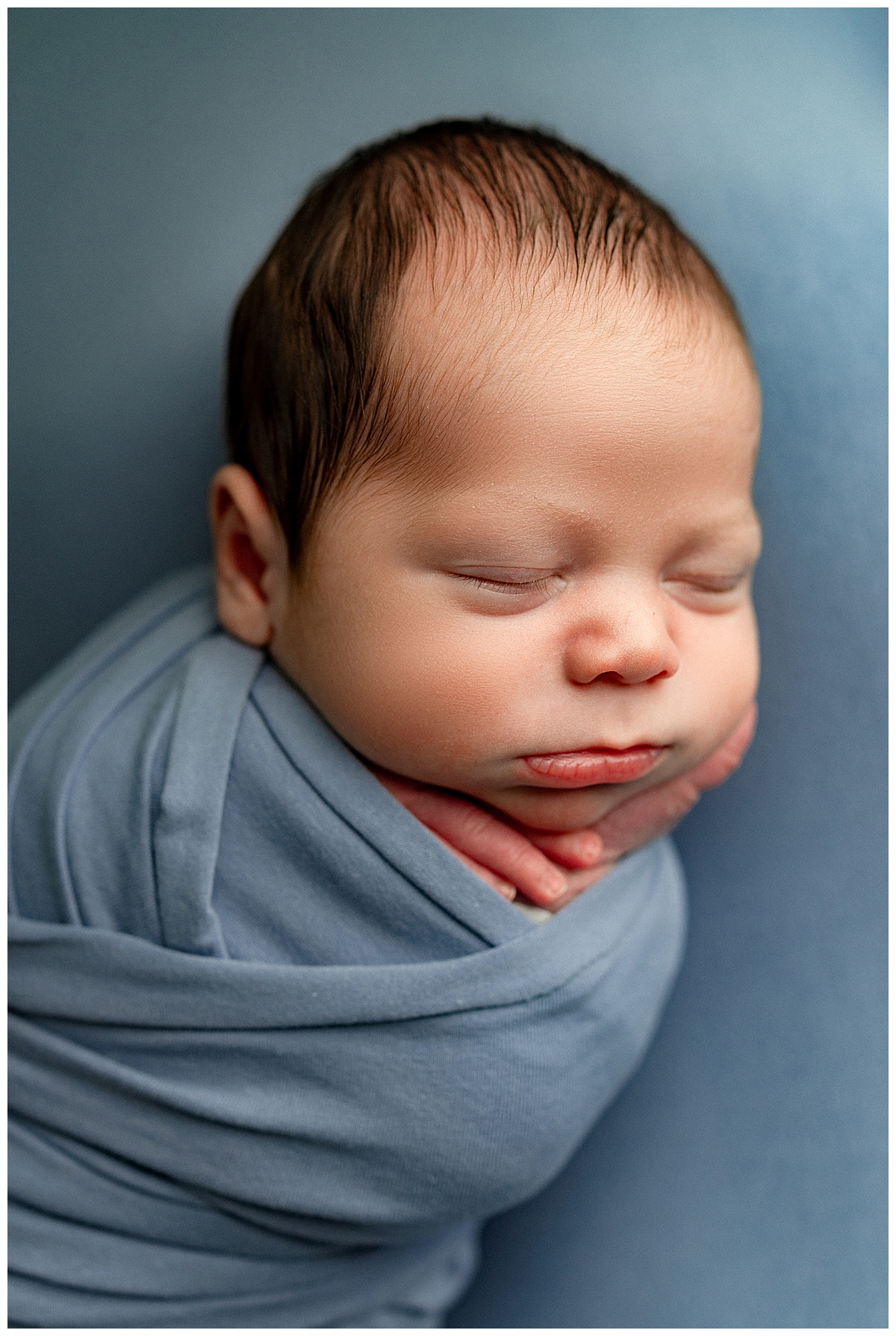 Baby is wrapped tightly for Virginia Newborn Photographer